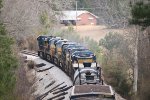 CSX 7706 leads 8 units round the curve